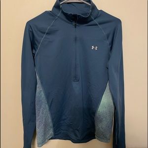 Half zip blue underarmour athletic jacket with thumb holes